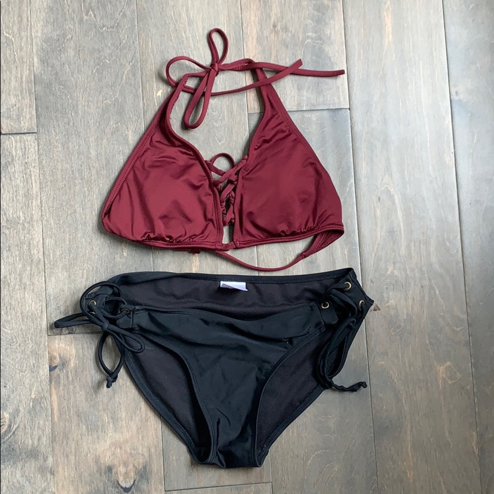 maroon baiting suit top w/ black bottoms
